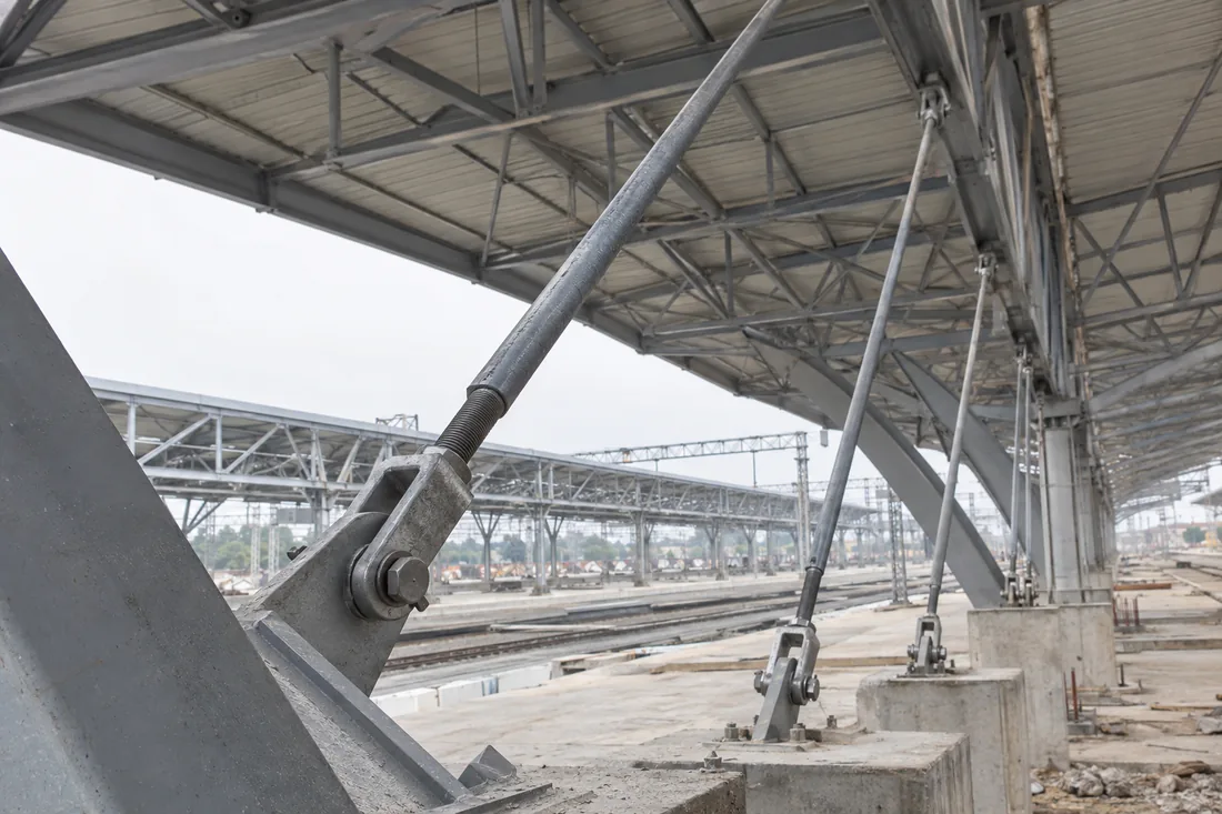 Illustrative railway canopy tension rods for a round steel application